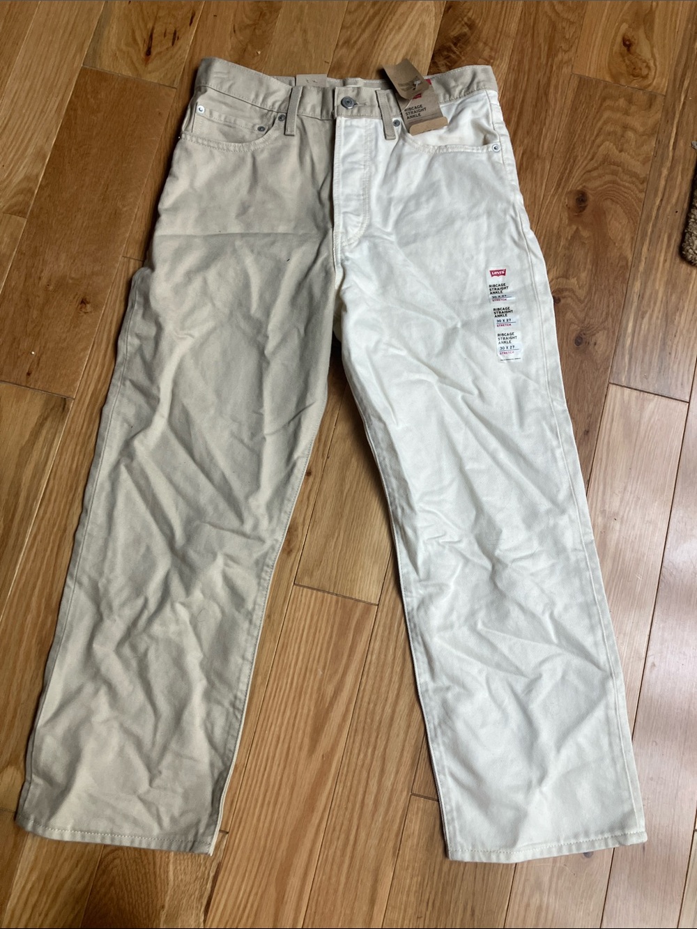 Levi's High-Rise Two-Tone Jeans in Tan & White